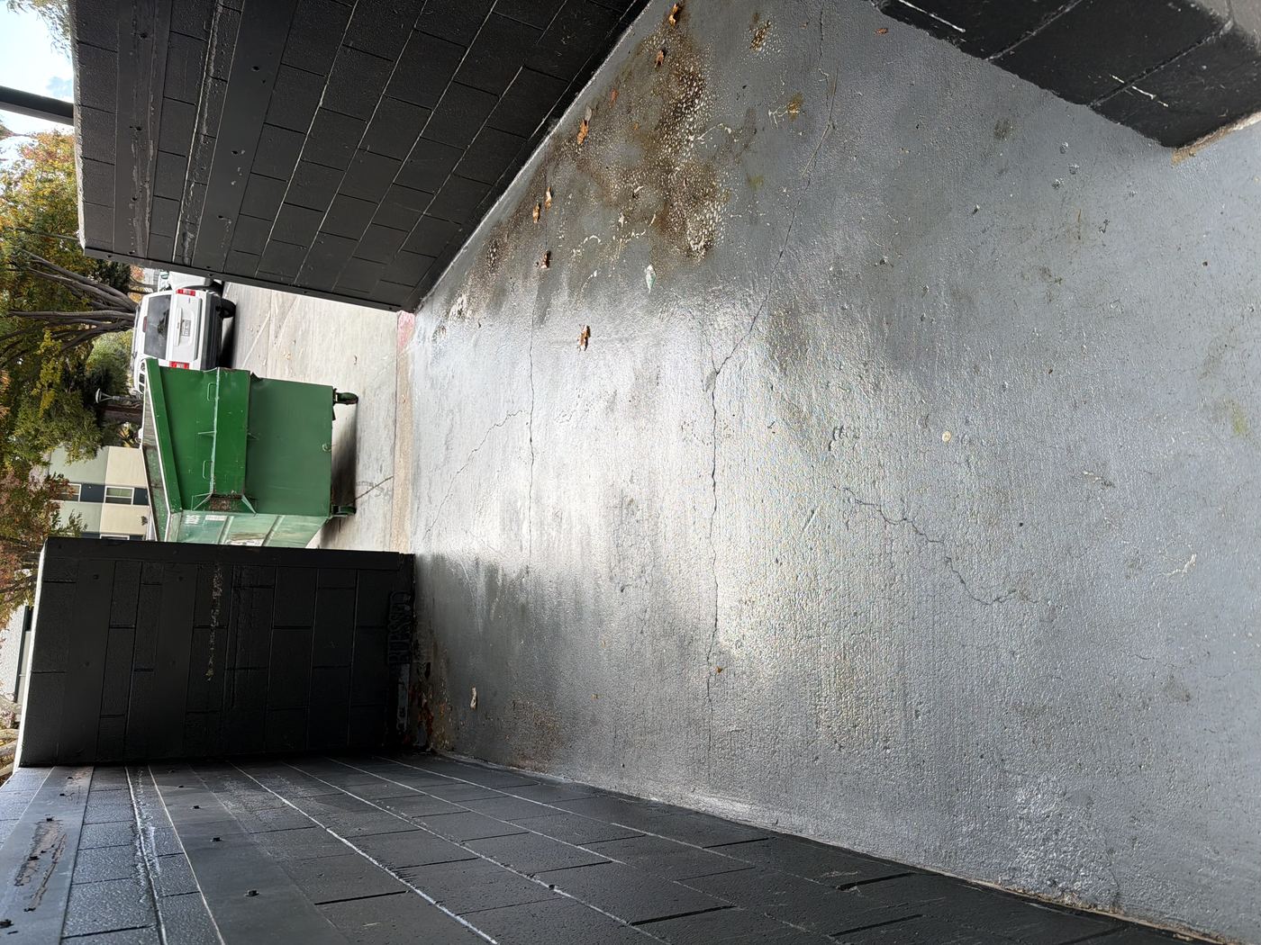 Clean loading area concrete after pressure washing